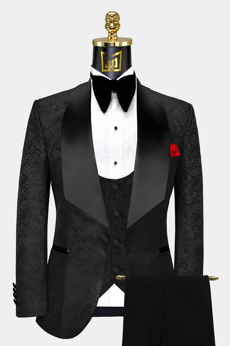 https://cdn.gentlemansguru.com/wp-content/uploads/2018/11/Mens-All-Black-Tuxedo-Groom-Wedding-Suit-Prom-Outfit-from-Gentlemansguru.com_.jpg?w=765&q=85&sharp=0.3&output=webp